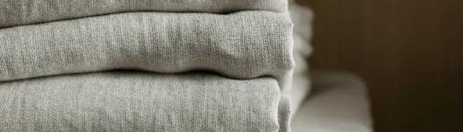 How does the durability of linen fabric compare to cotton for clothing